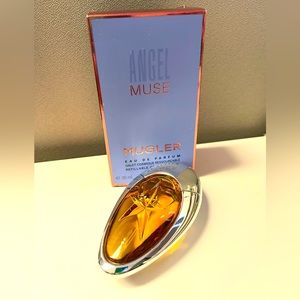 Angel Muse EDP 1oz refillable bottle with box never been used.
